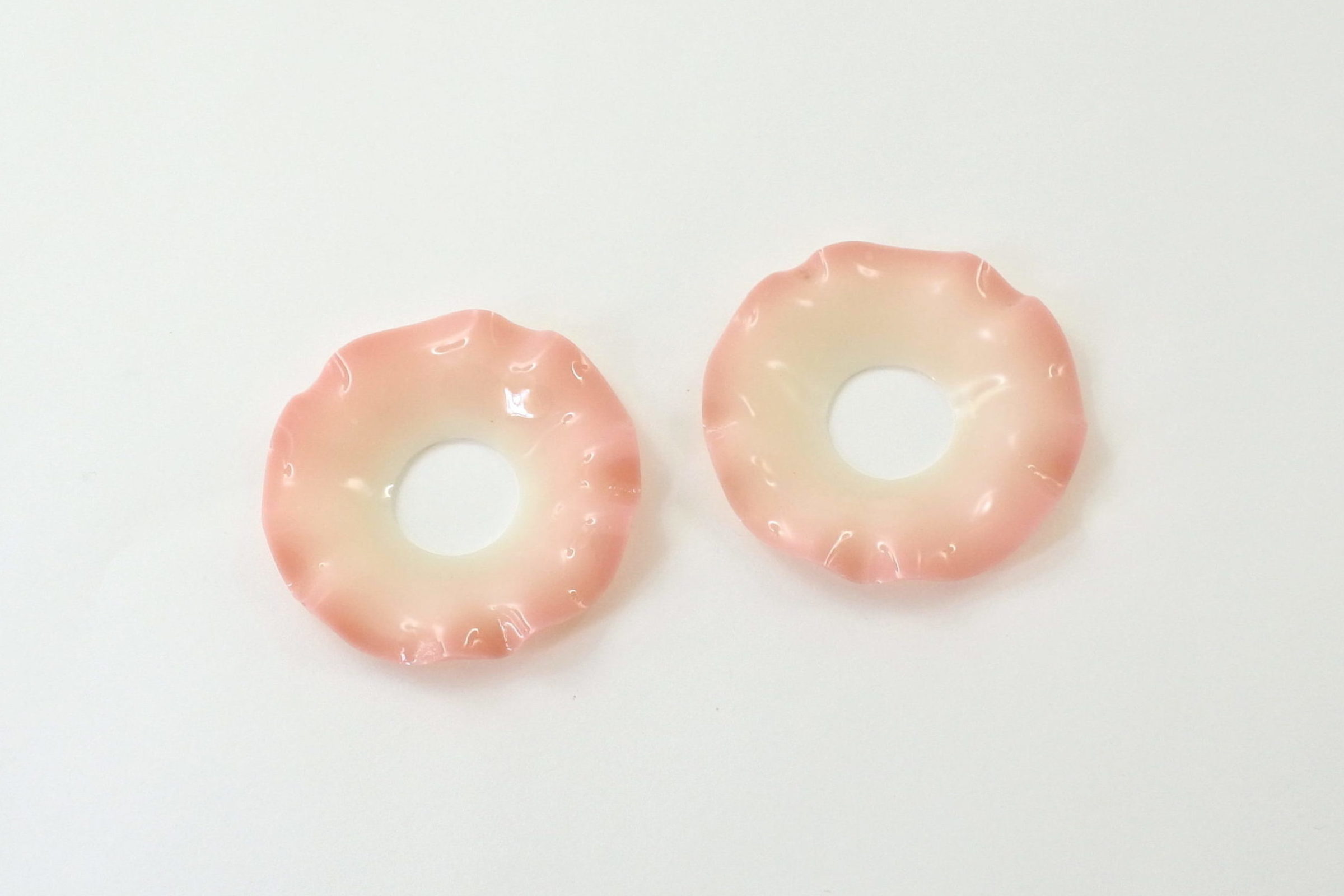 Coppia di bobeches raccoglicera in opaline rosa e bianca sfumata