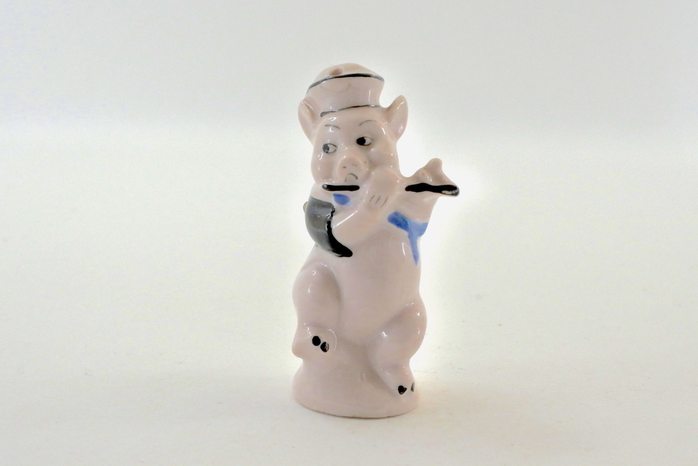 Portasale in ceramica a forma di maialino umanizzato