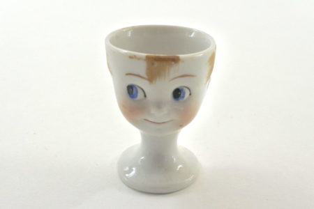 Portauovo in ceramica a forma di viso di bimbo