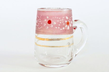 Bicchierino da liquore in vetro soffiato con manico e decoro a smalto