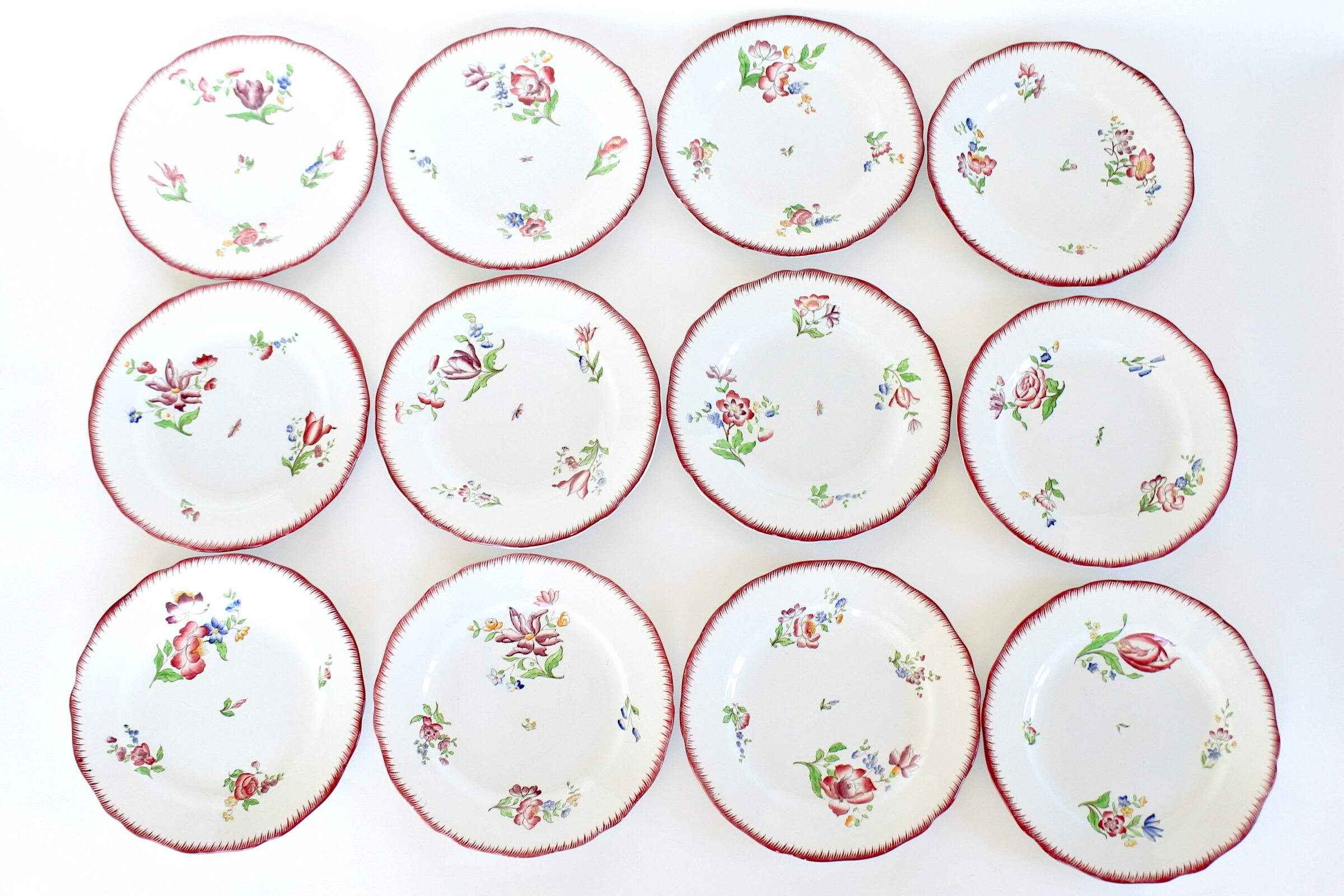 12 piatti in ceramica di Sarreguemines con decoro Strasbourg