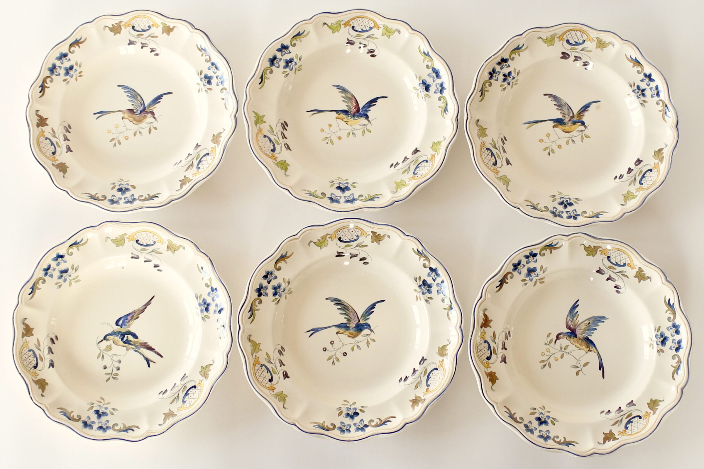 6 piatti in ceramica di Longchamp con uccellino e ramo di fiori