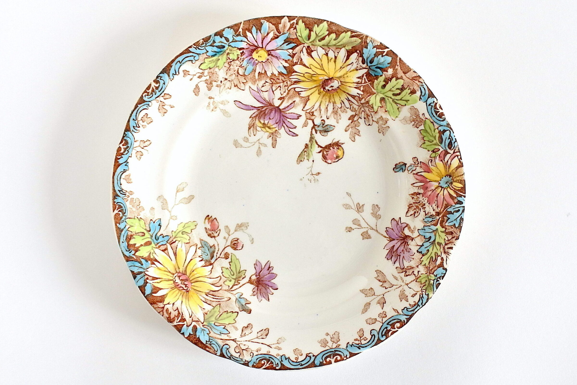 Piatto da dessert in ceramica di Gien del 1878 con decoro fiori d’autunno