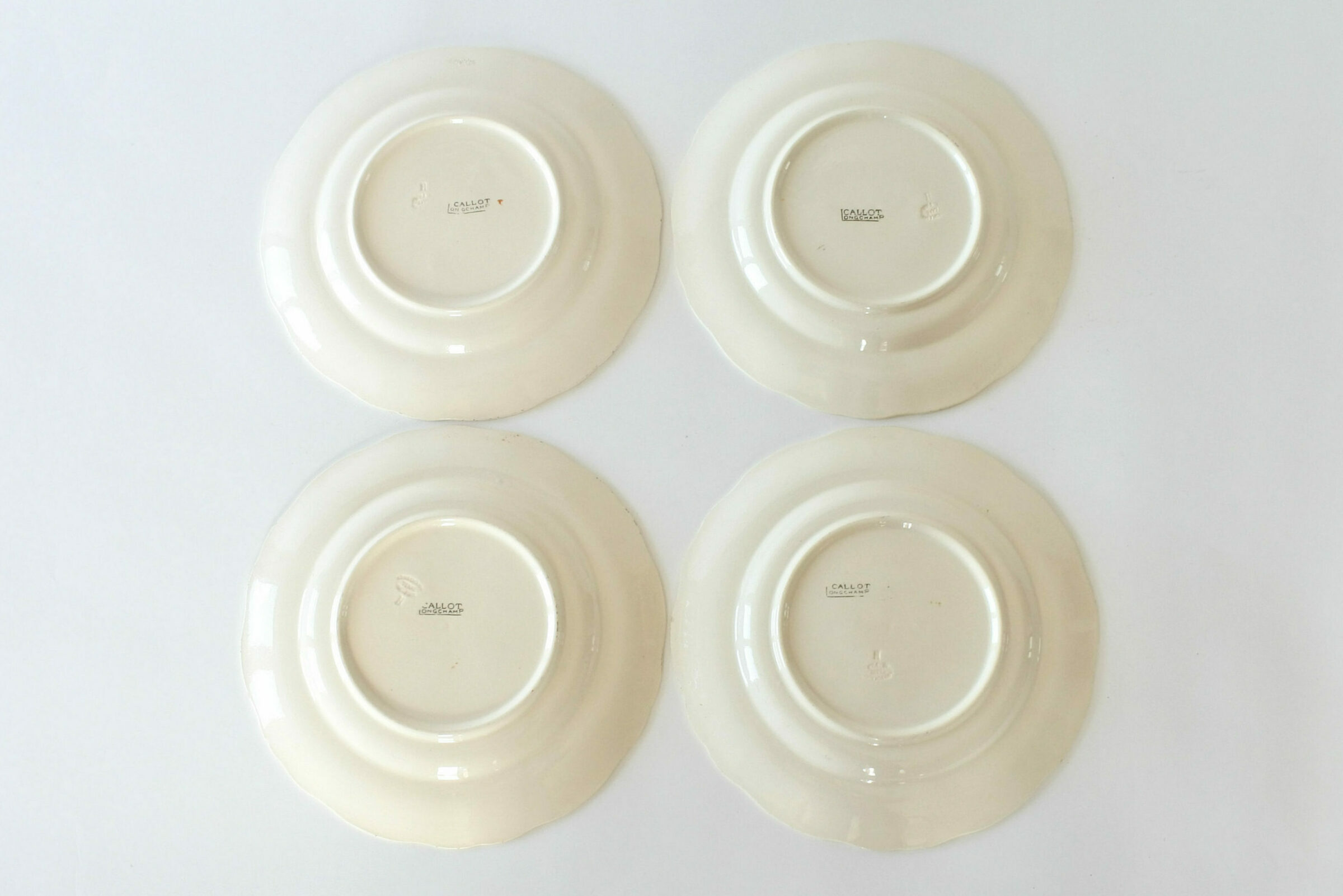 4 piatti in ceramica di Longchamp con maschere di Jacques Callot - 2